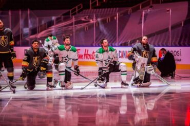 Players of the @dallasstars and @vegasgoldenknights kneel during the National An...